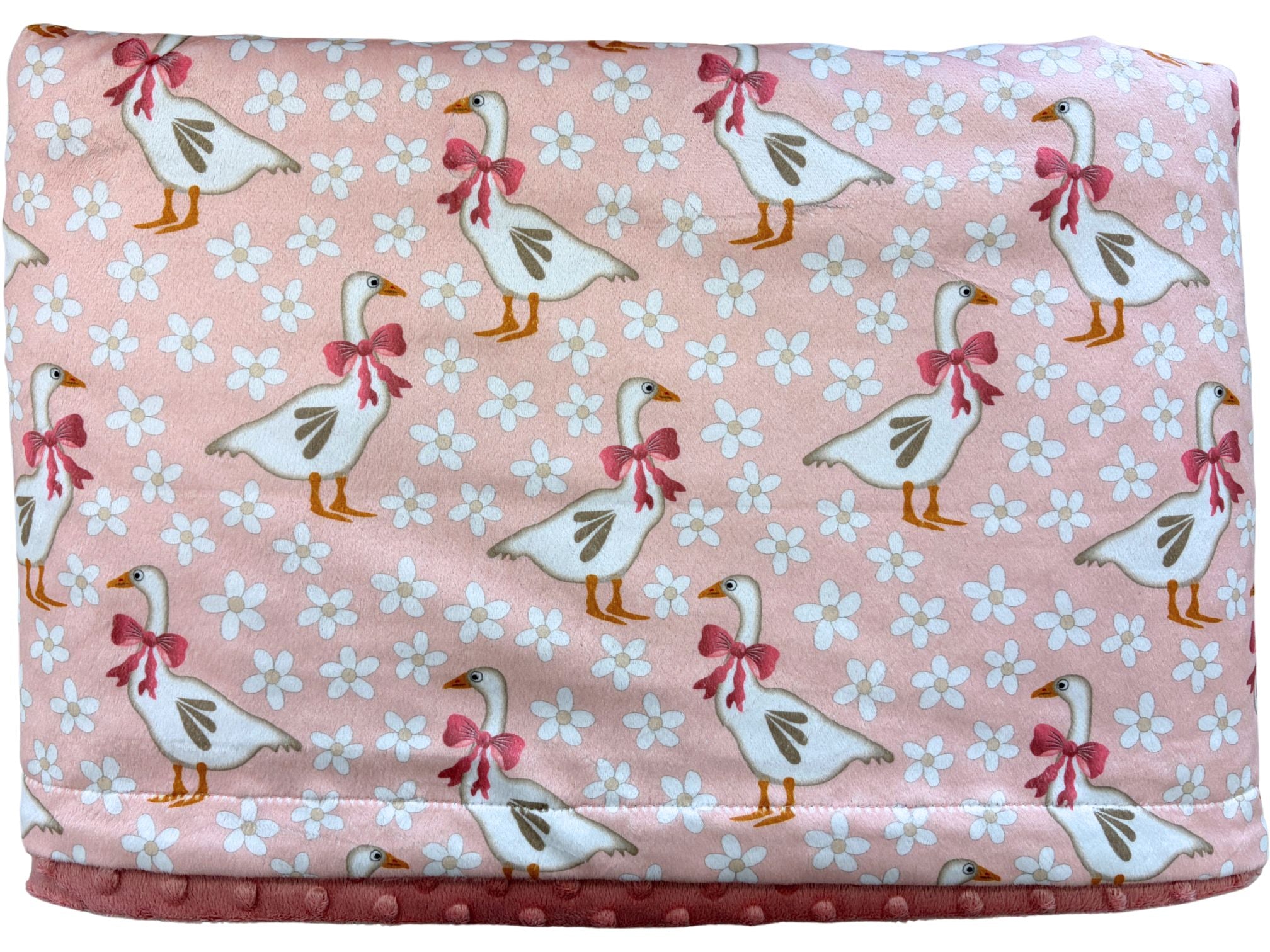 Couverture de bébé : Oies jardins de marguerites fond rose