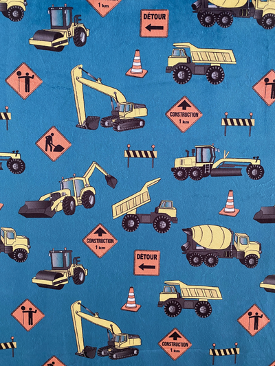 Couverture de bébé : Camions de construction (fond bleu sarcelle)