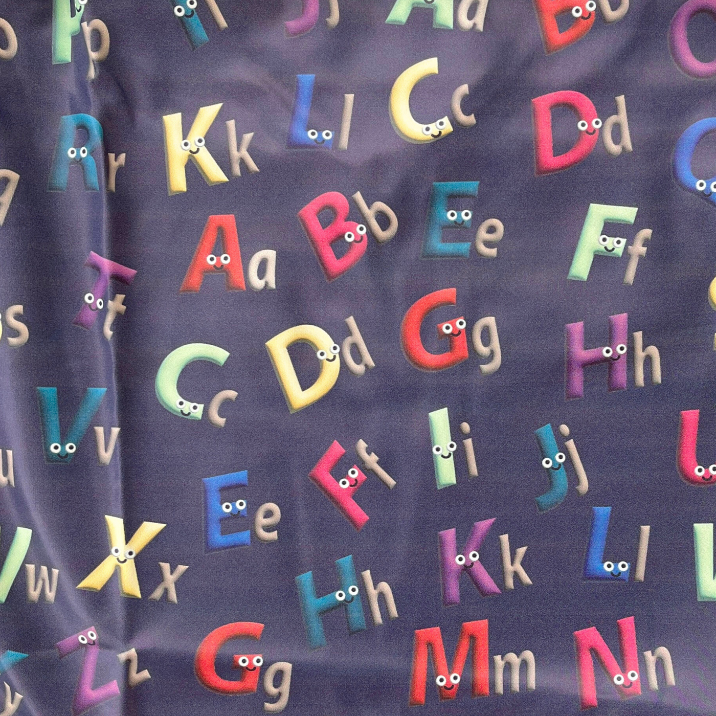 Waterproof bib with pocket: The friendly alphabets