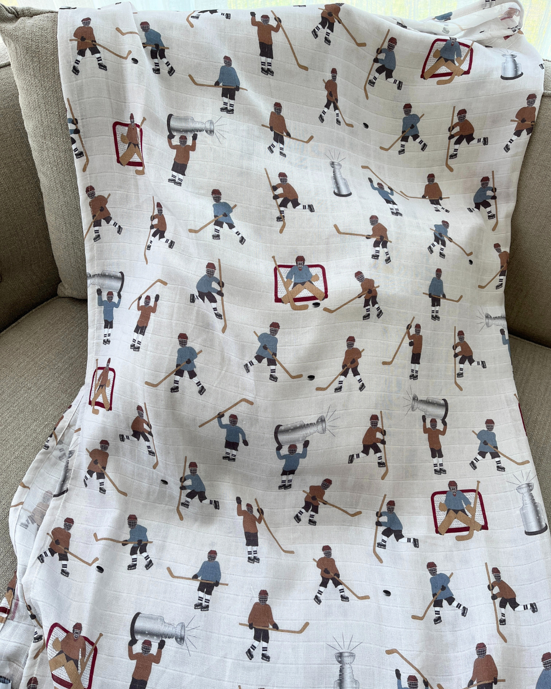 Muslin swaddle blanket: Hockey players (blue vs brown)