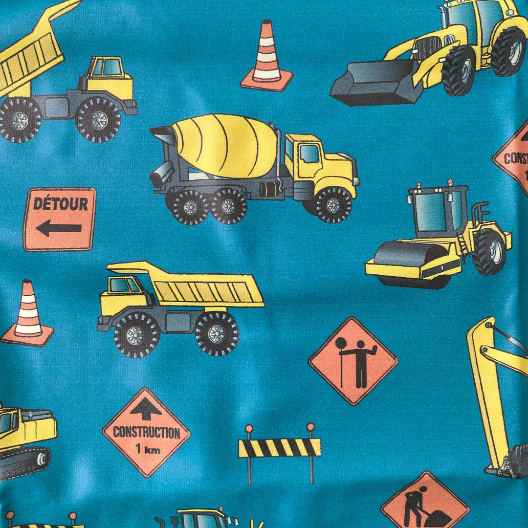 Waterproof Bib Apron with long sleeves and pocket: Construction Trucks