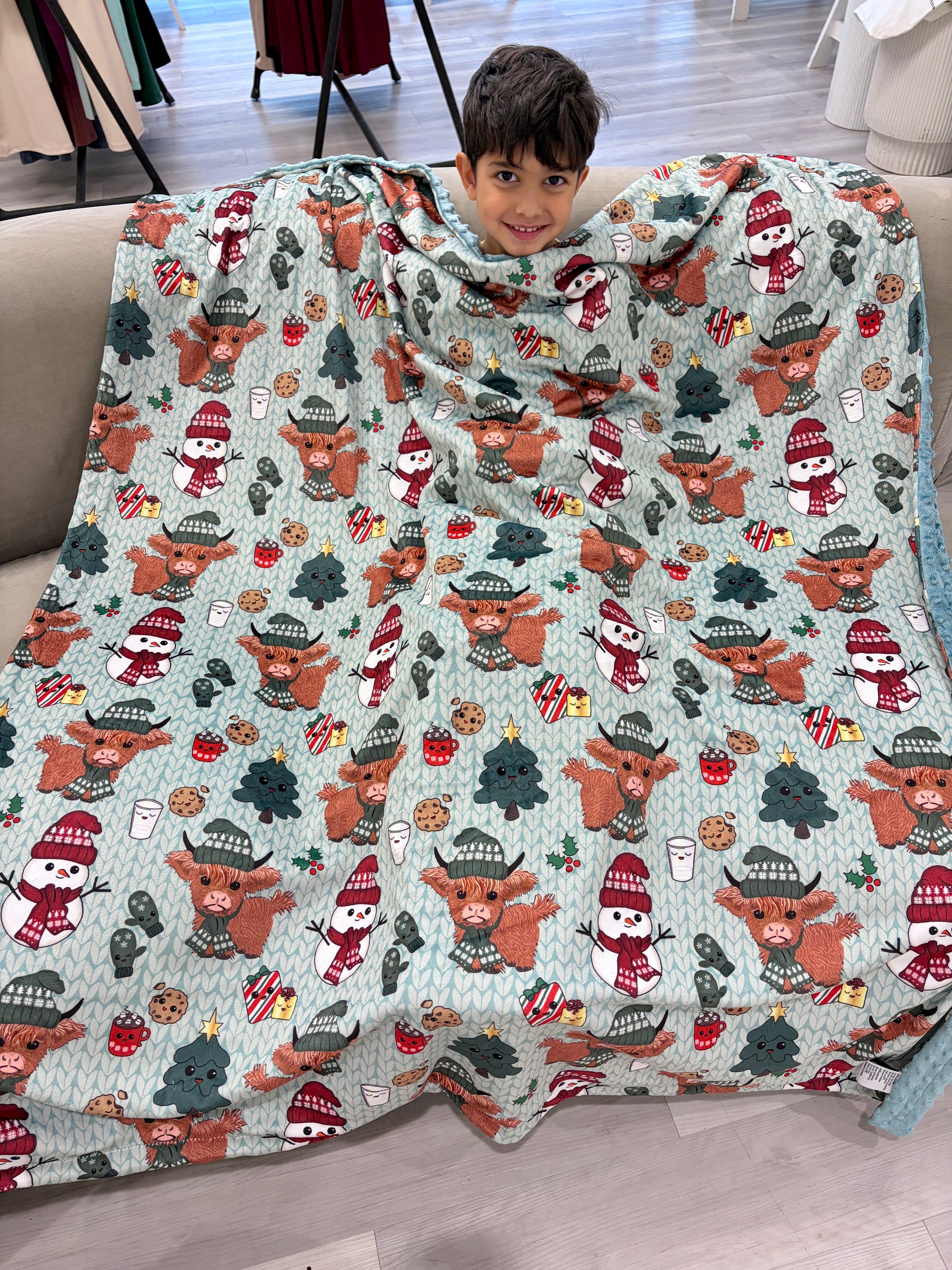 Couverture Moyenne : La vache highland et son ami bonhomme de neige