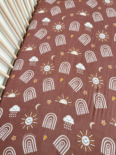 Fitted sheet for crib in muslin: Radiant Sun BOHO (earth background)