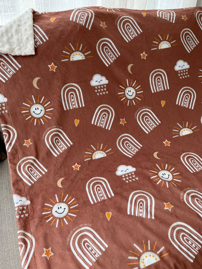 Couverture de bébé : Soleil radieux BOHO (fond terre)