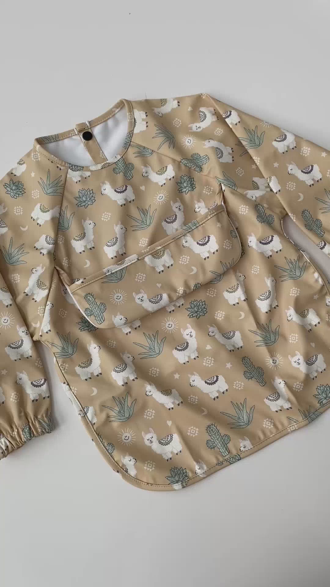 Waterproof Bib Apron with long sleeves and pocket: Sunny llamas