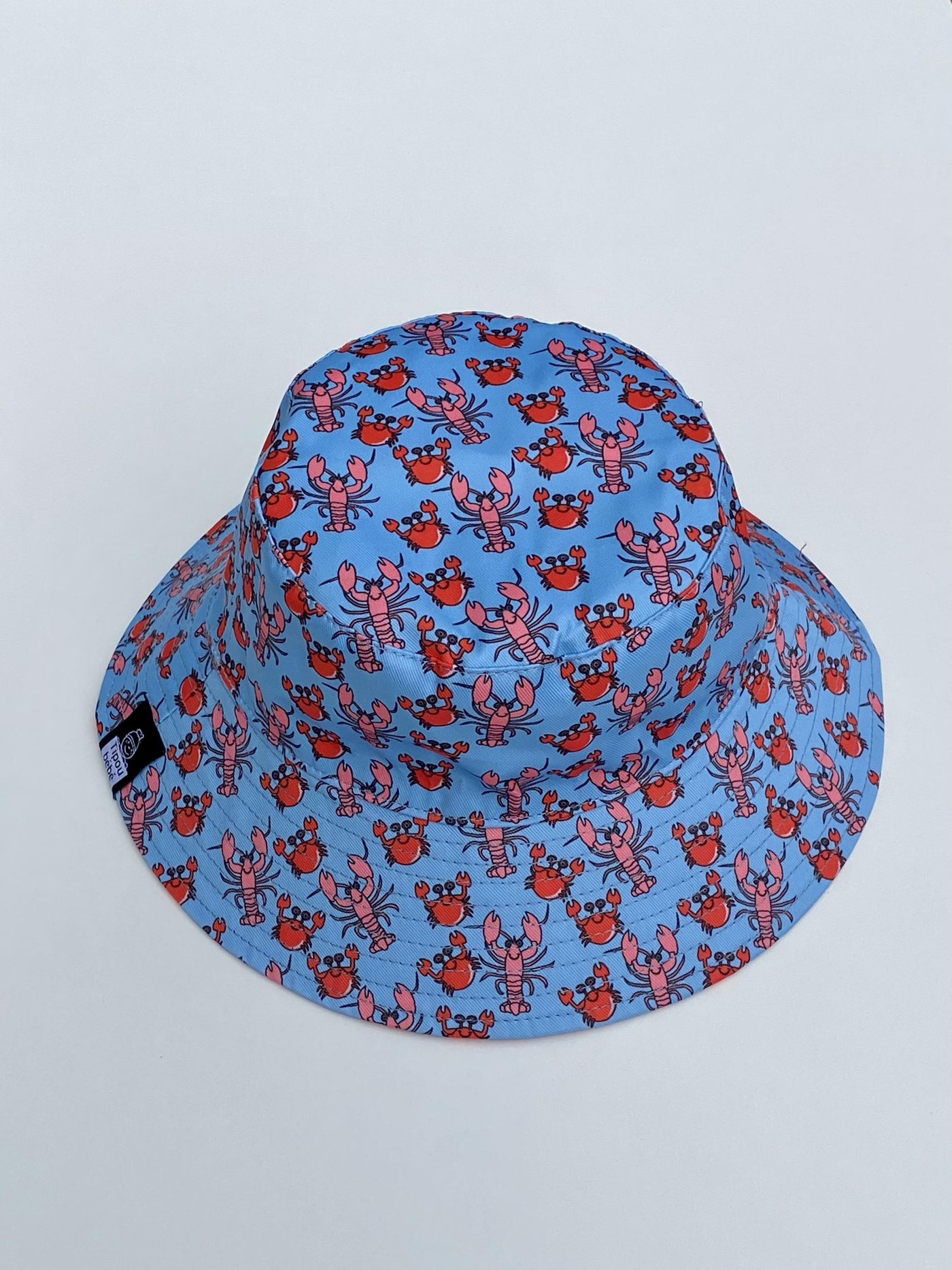 Reversible hat:lobsters and crabs